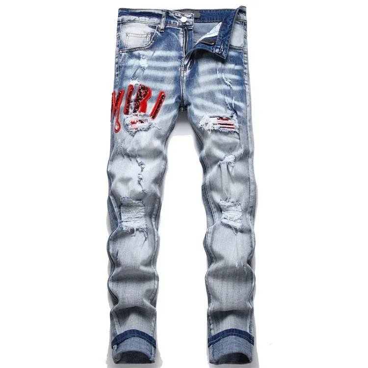 Ripped Distressed Denim Jeans with Red Logo Patch  