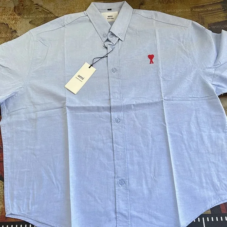 Ami Light Blue Short-Sleeve Button-Up Shirt with Red Logo