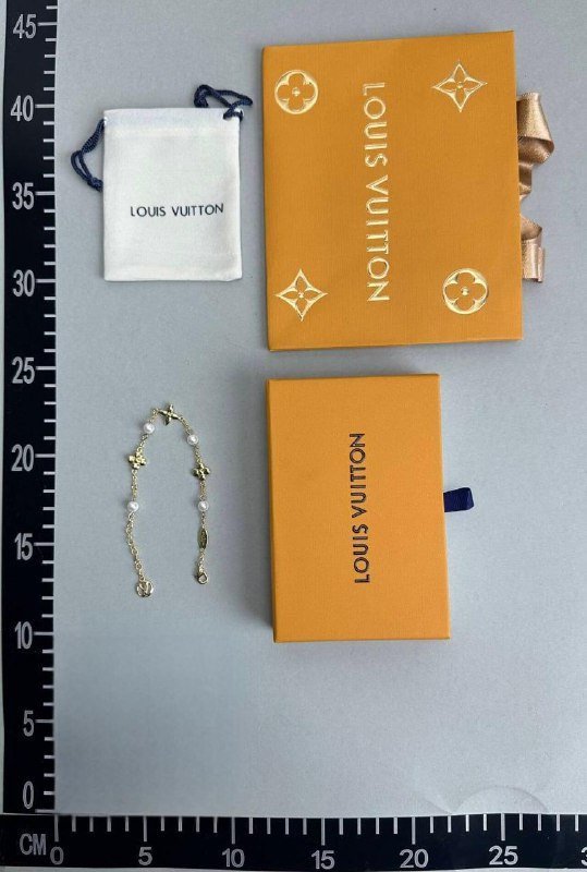 LV Monogram World Tour Bracelet Gold Pearl Chain